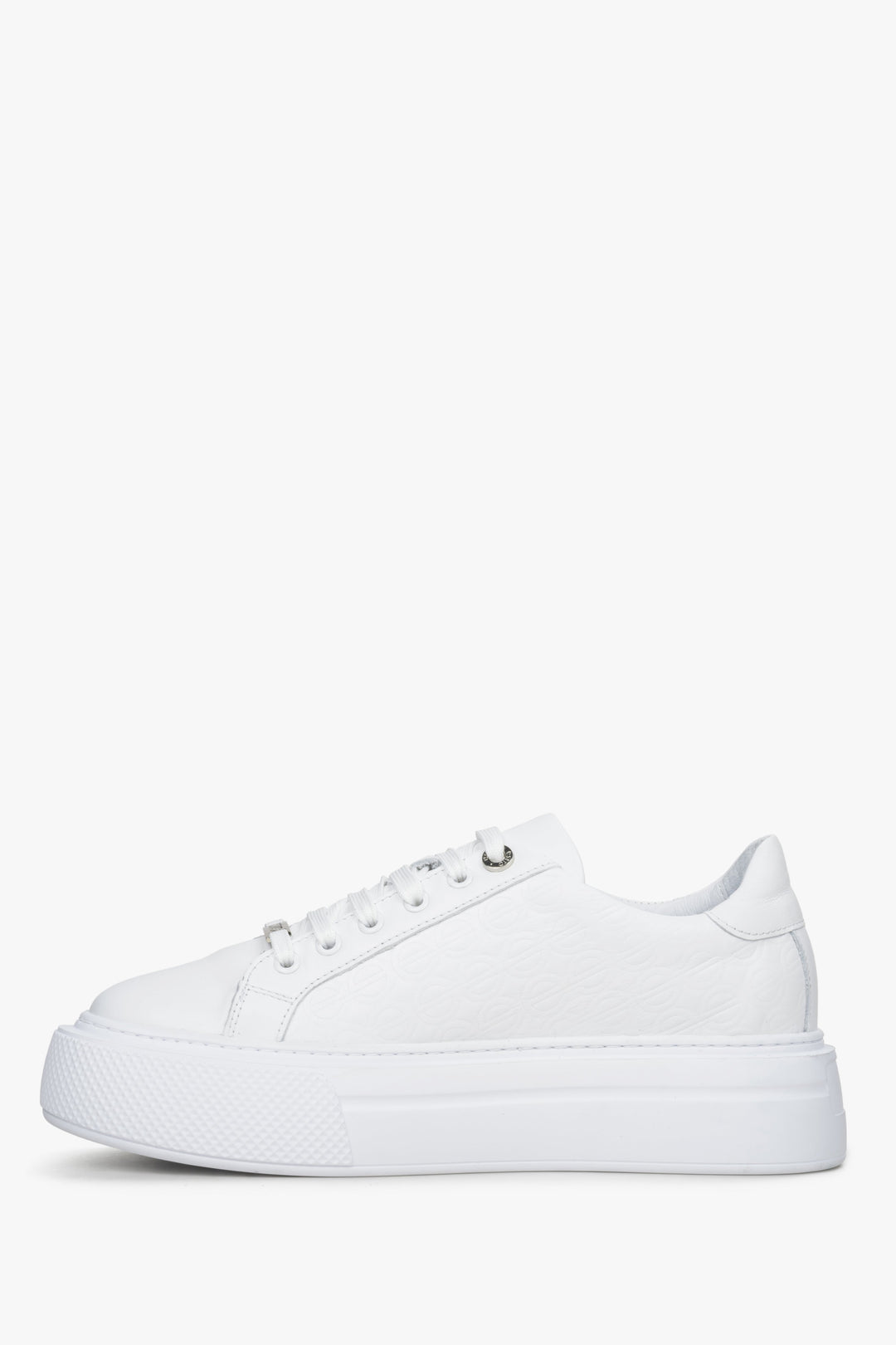Women's white leather sneakers by Estro - shoe profile.