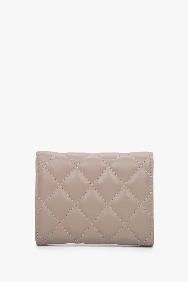 A handy women's light pink wallet with Estro embossing - back side.