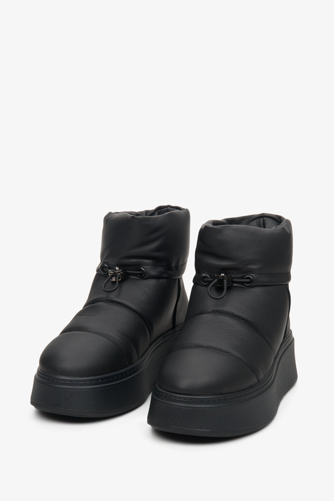Women's black leather snow boots by Estro.