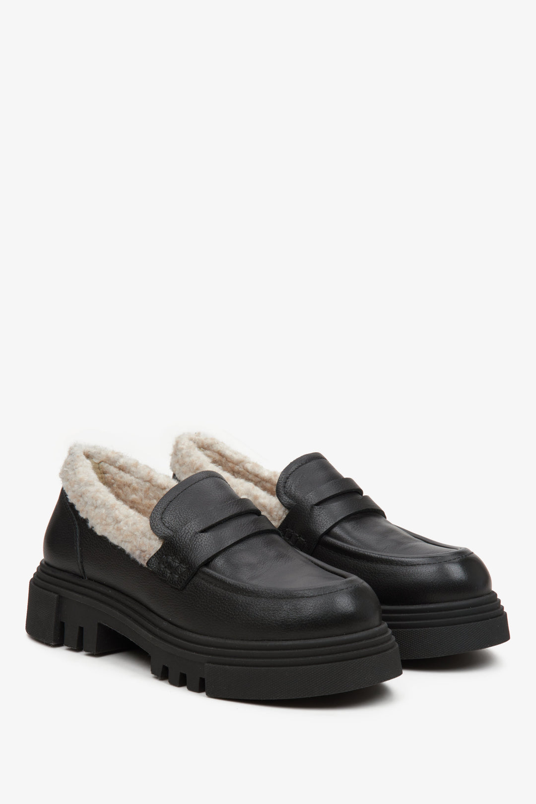 Women's insulated, black Estro leather moccasins - close-up of the toe box and side profile.