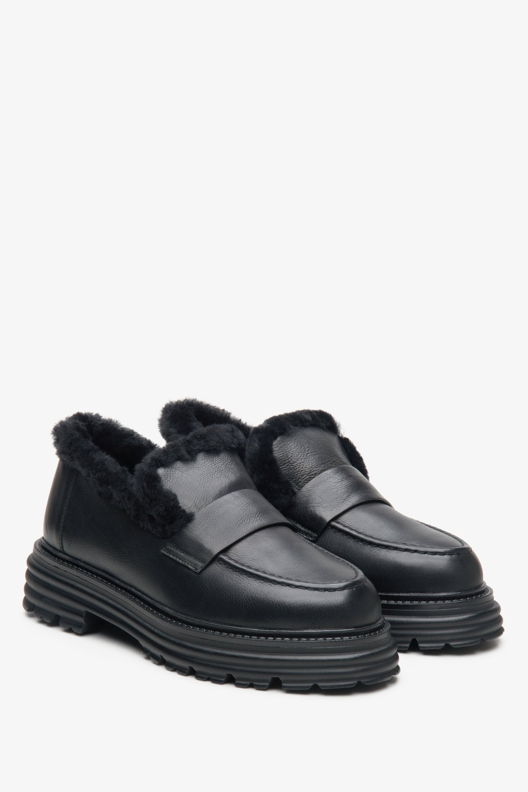 Winter women's moccasins in black with black fur lining by Estro.