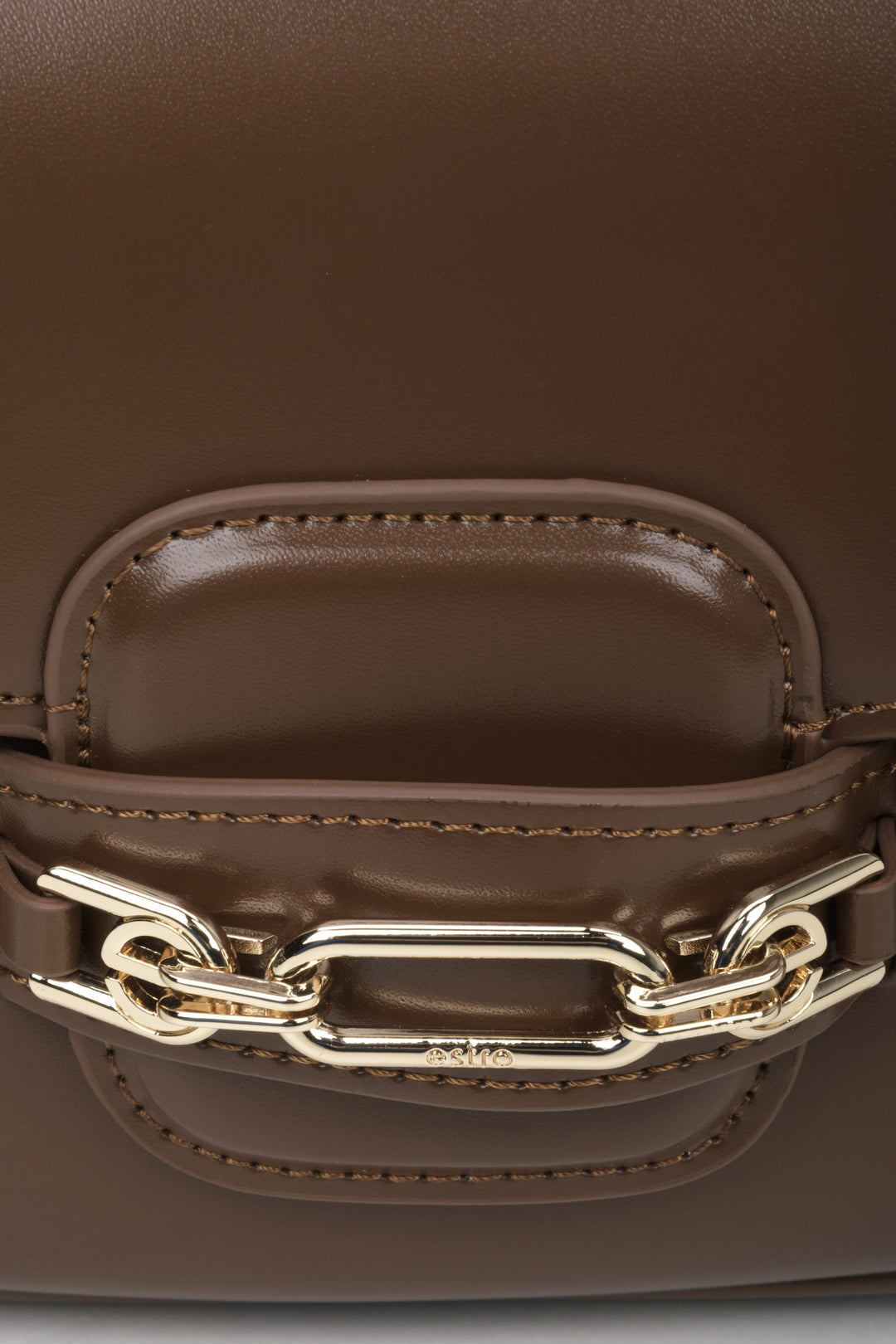 Women's brown leather bag - close-up on the detail.