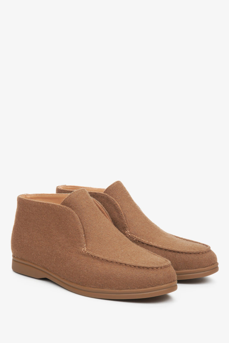 Women's brown elevated moccasins by Estro.