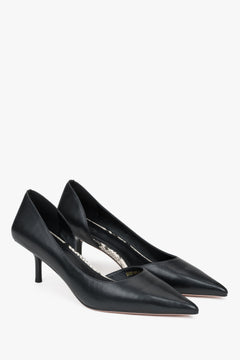 Classic black Estro women's high heels, made of genuine leather, set on a comfortable low heel.