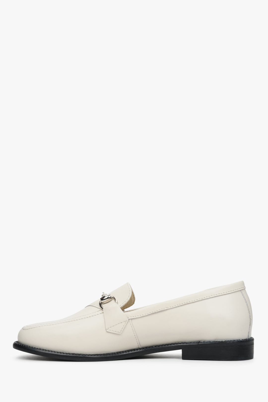 Women's white leather loafers with gold buckle - shoe side.