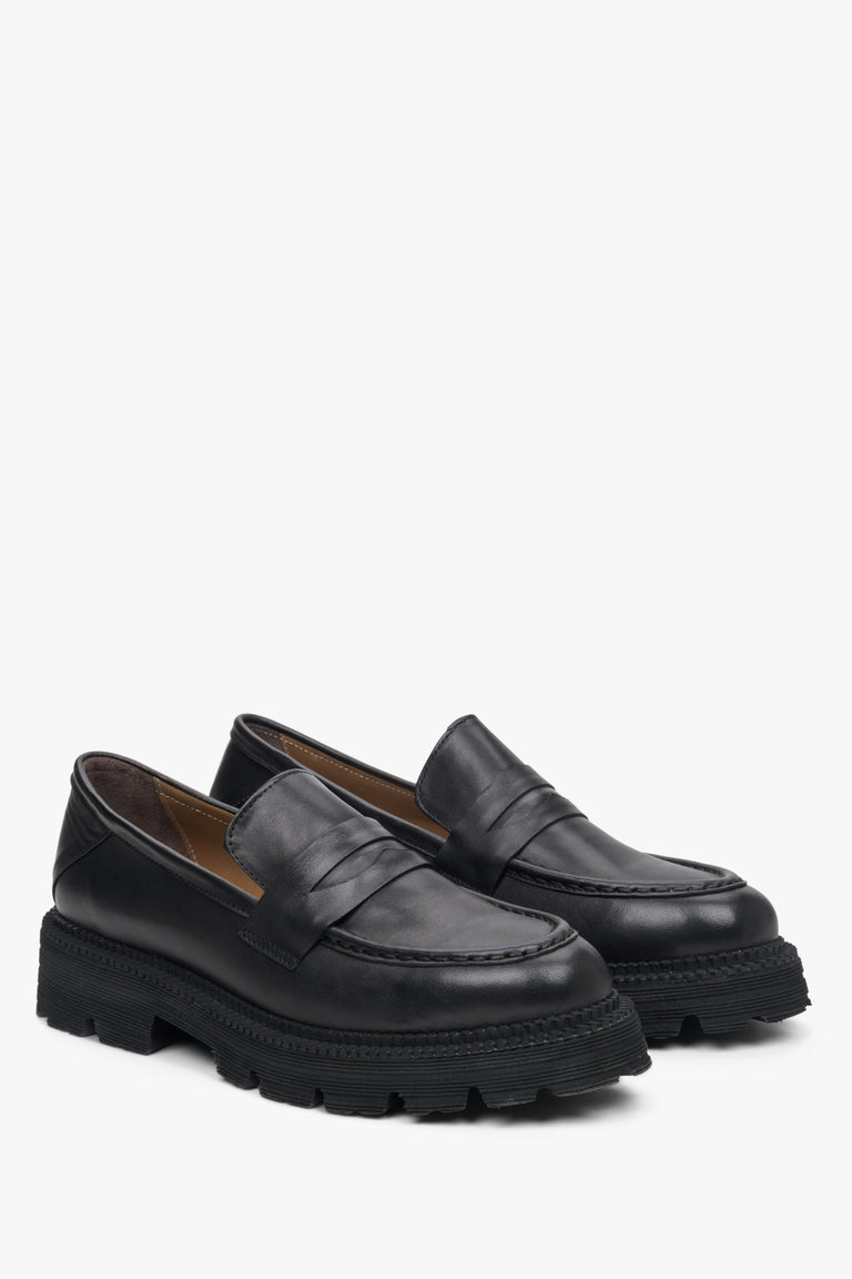 Women's black leather moccasins by Estro.