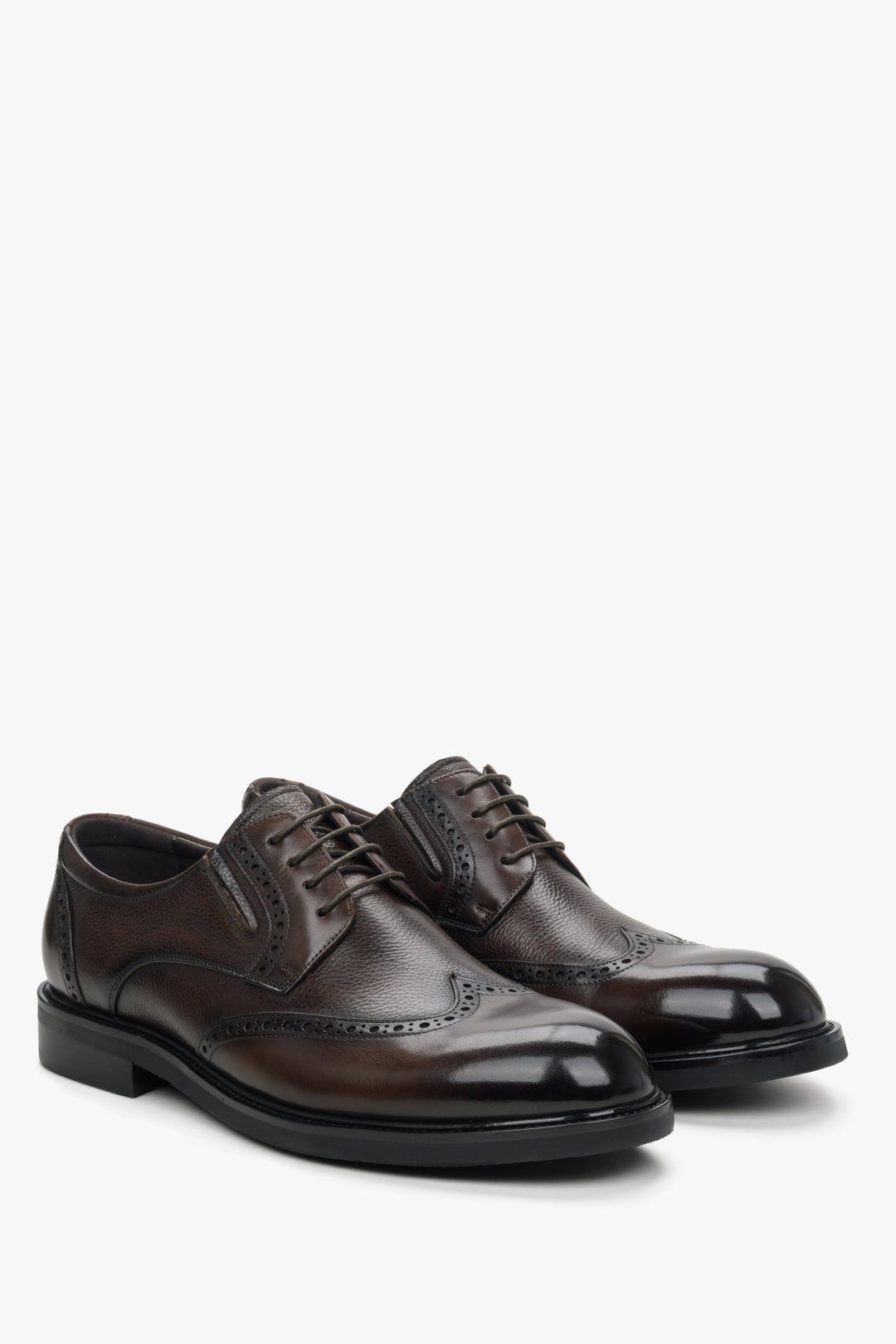 Estro men's brown leather shoes with decorative perforation.
