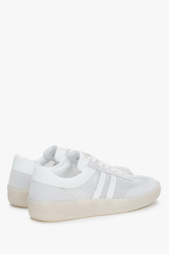 Side profile of women's sneakers, showing the white and beige design with Italian leather and mesh.