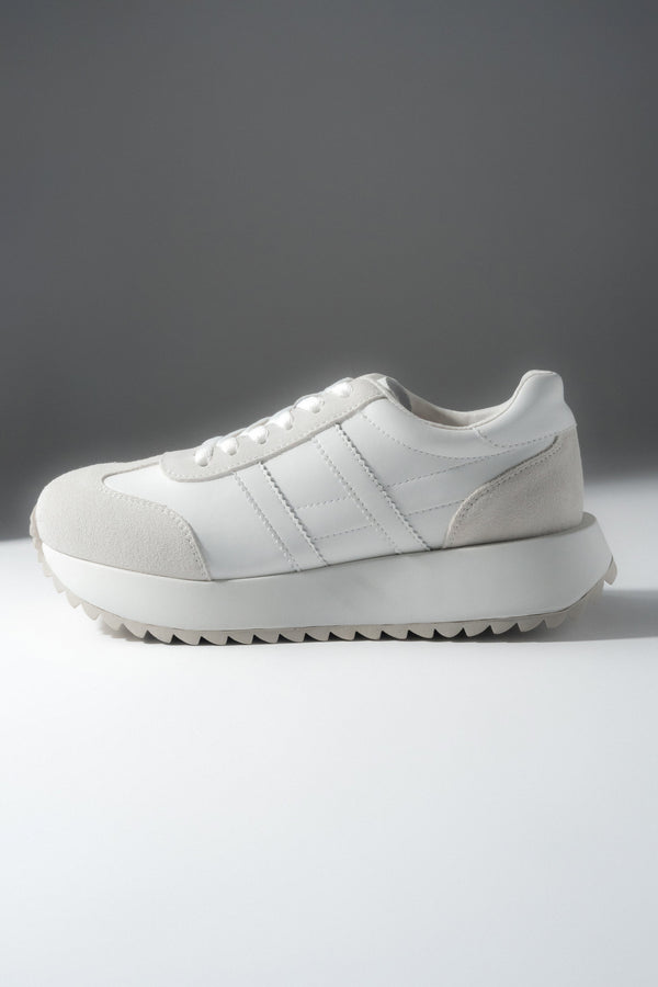 White sneakers for women, featuring a genuine leather and suede upper.