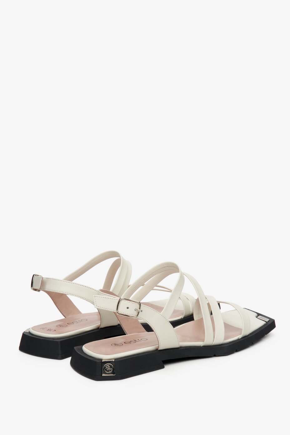 Leather, women's white sandals by Estro with thin straps - presentation of the back part of the shoes.