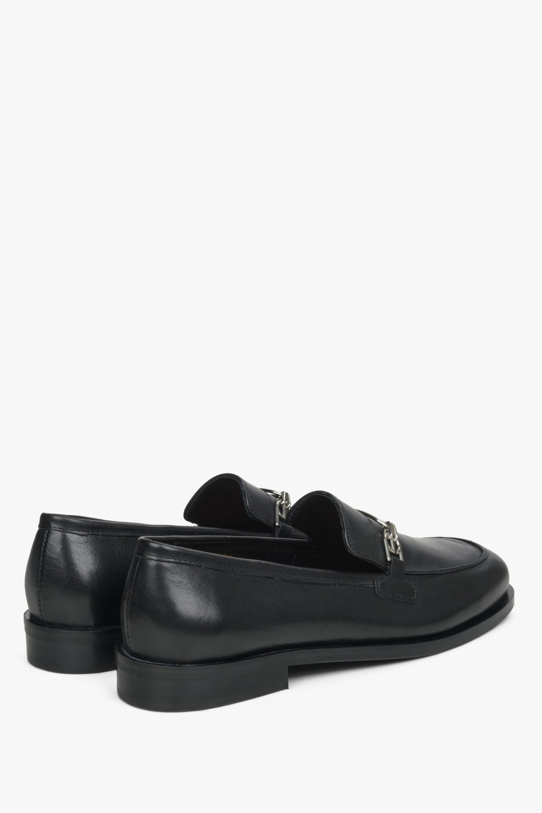 Women's black penny loafers Estro - a close-up on shoe heel counter.
