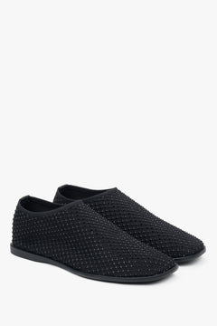 Stylish women's black flats by Estro, crafted from delicate mesh and adorned with shimmering rhinestones.