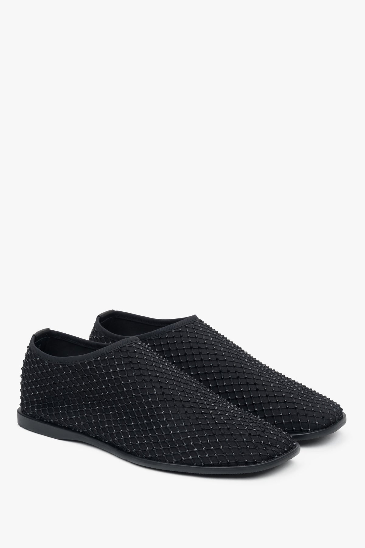 Stylish women's black flats by Estro, crafted from delicate mesh and adorned with shimmering rhinestones.