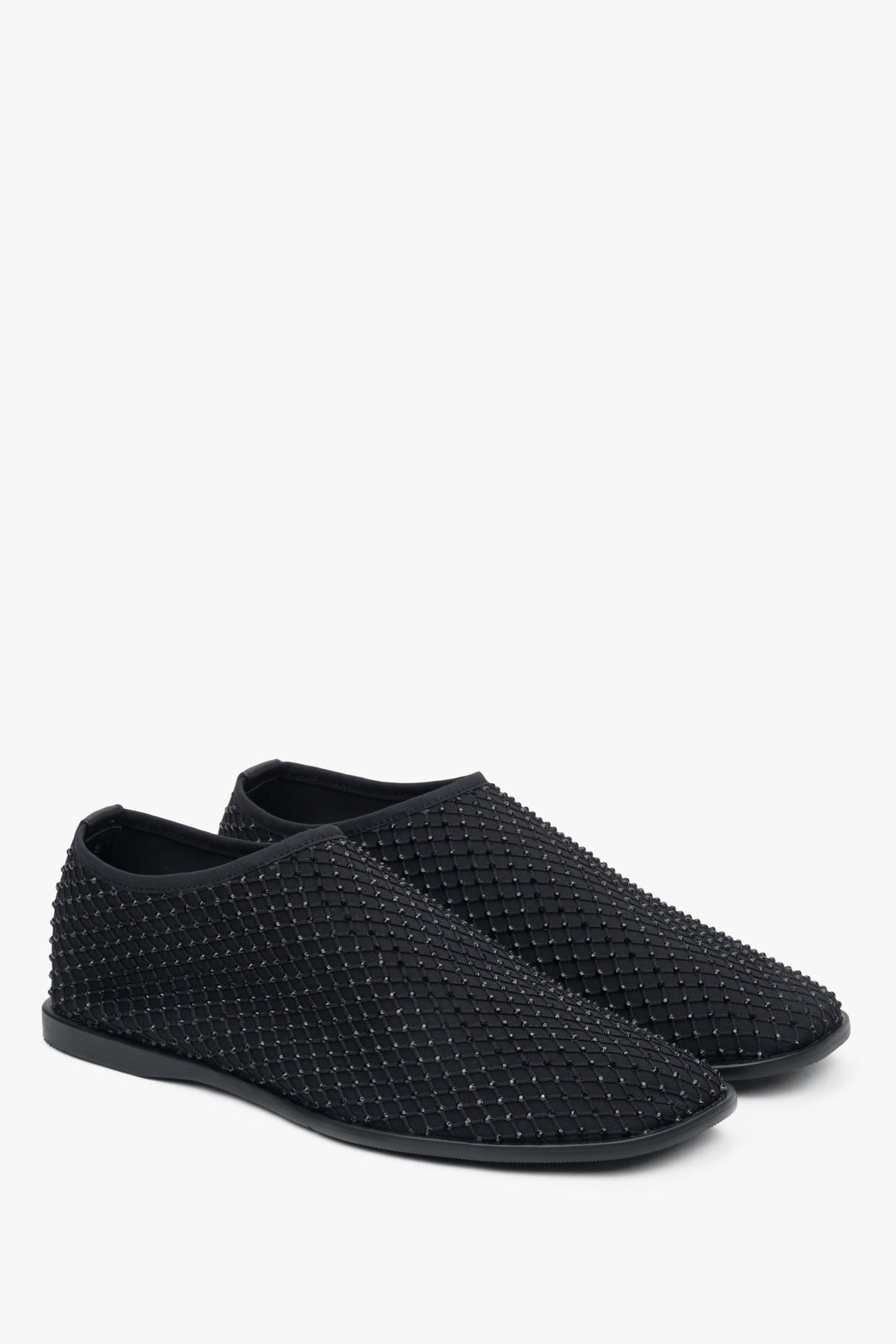 Stylish women's black flats by Estro, crafted from delicate mesh and adorned with shimmering rhinestones.