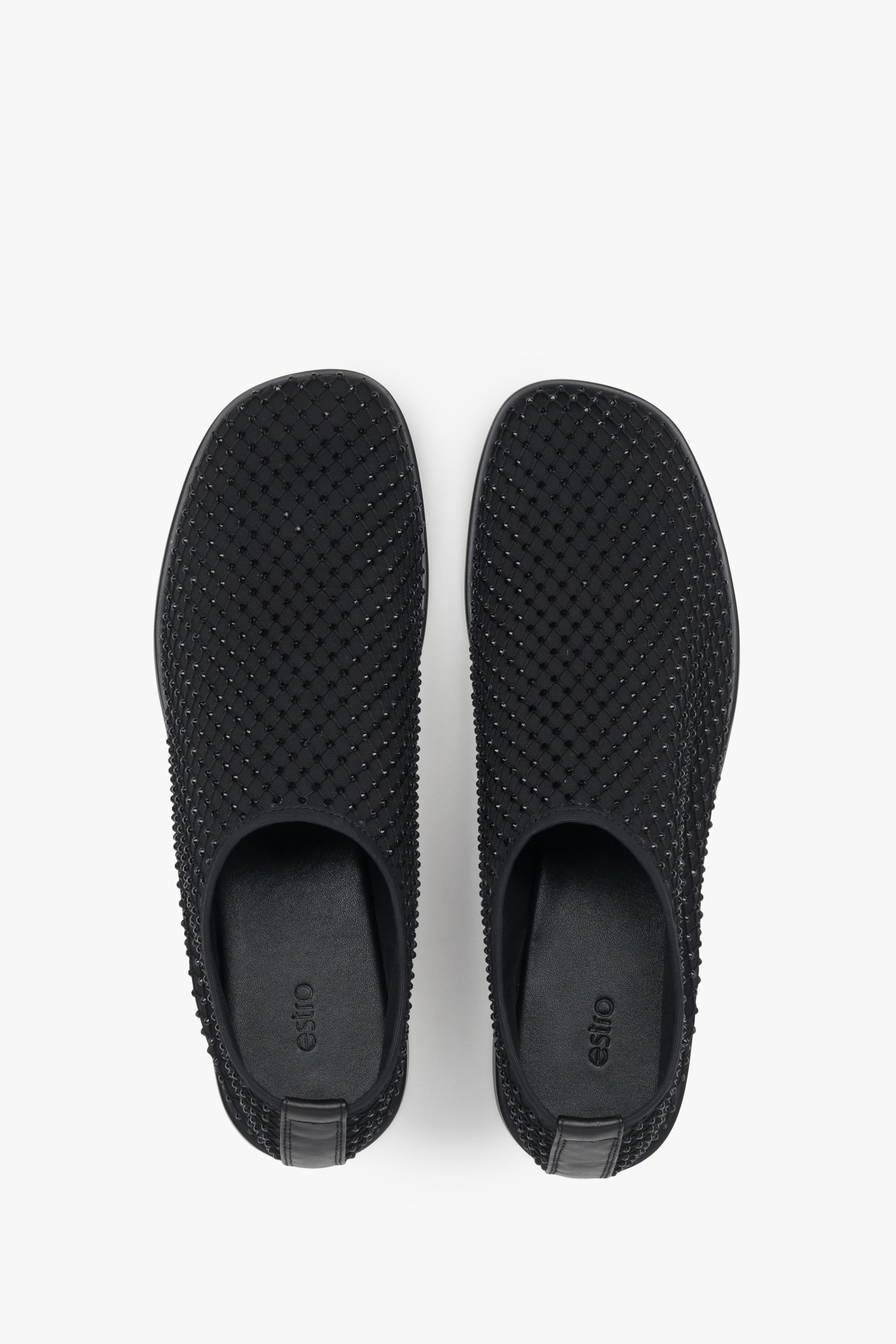 Unique black flats for women by Estro, featuring a combination of breathable mesh and shimmering rhinestones.