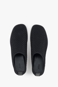 Unique black flats for women by Estro, featuring a combination of breathable mesh and shimmering rhinestones.