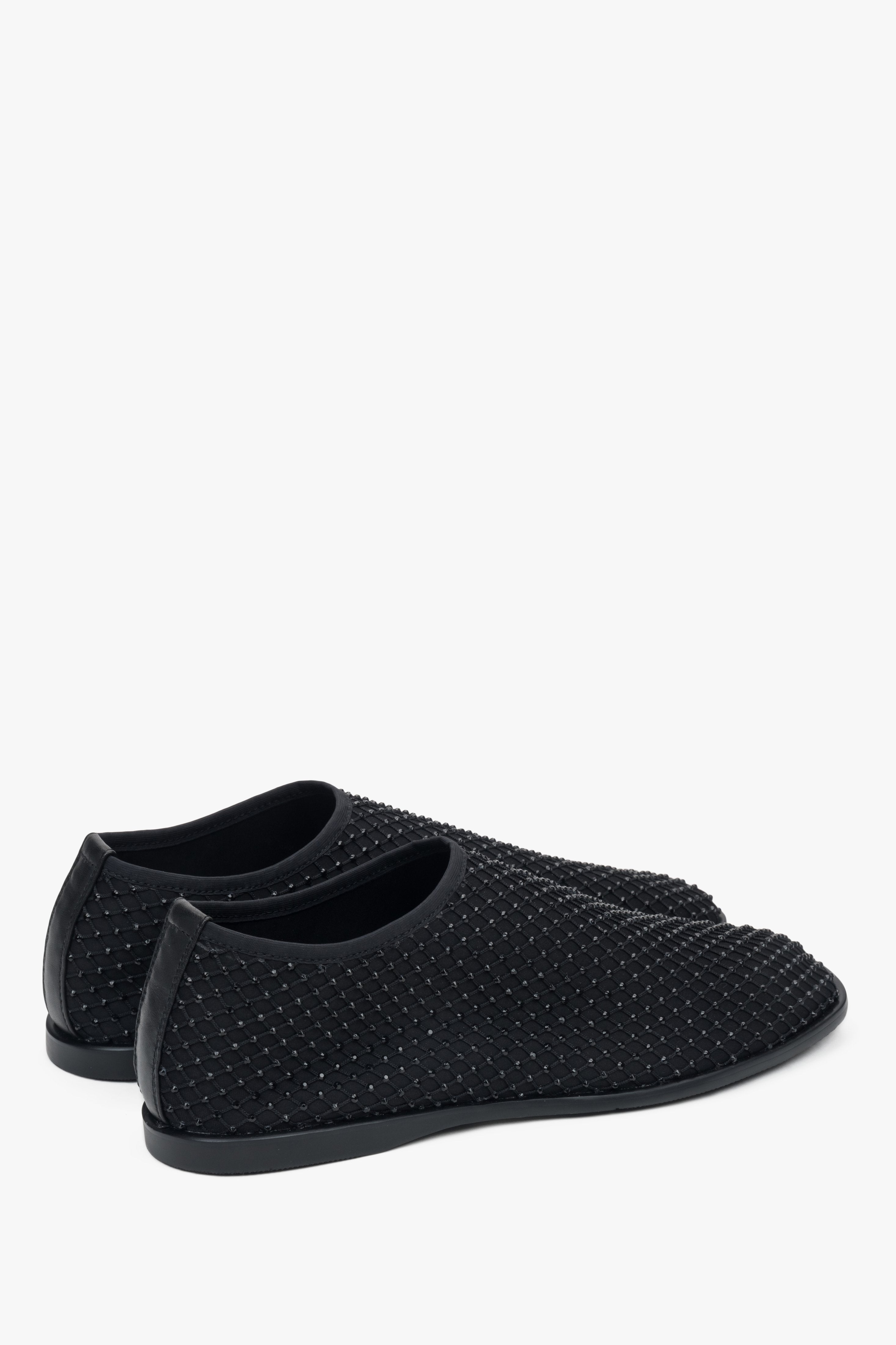 Black flats for women made of soft mesh with shimmering rhinestones by Estro.