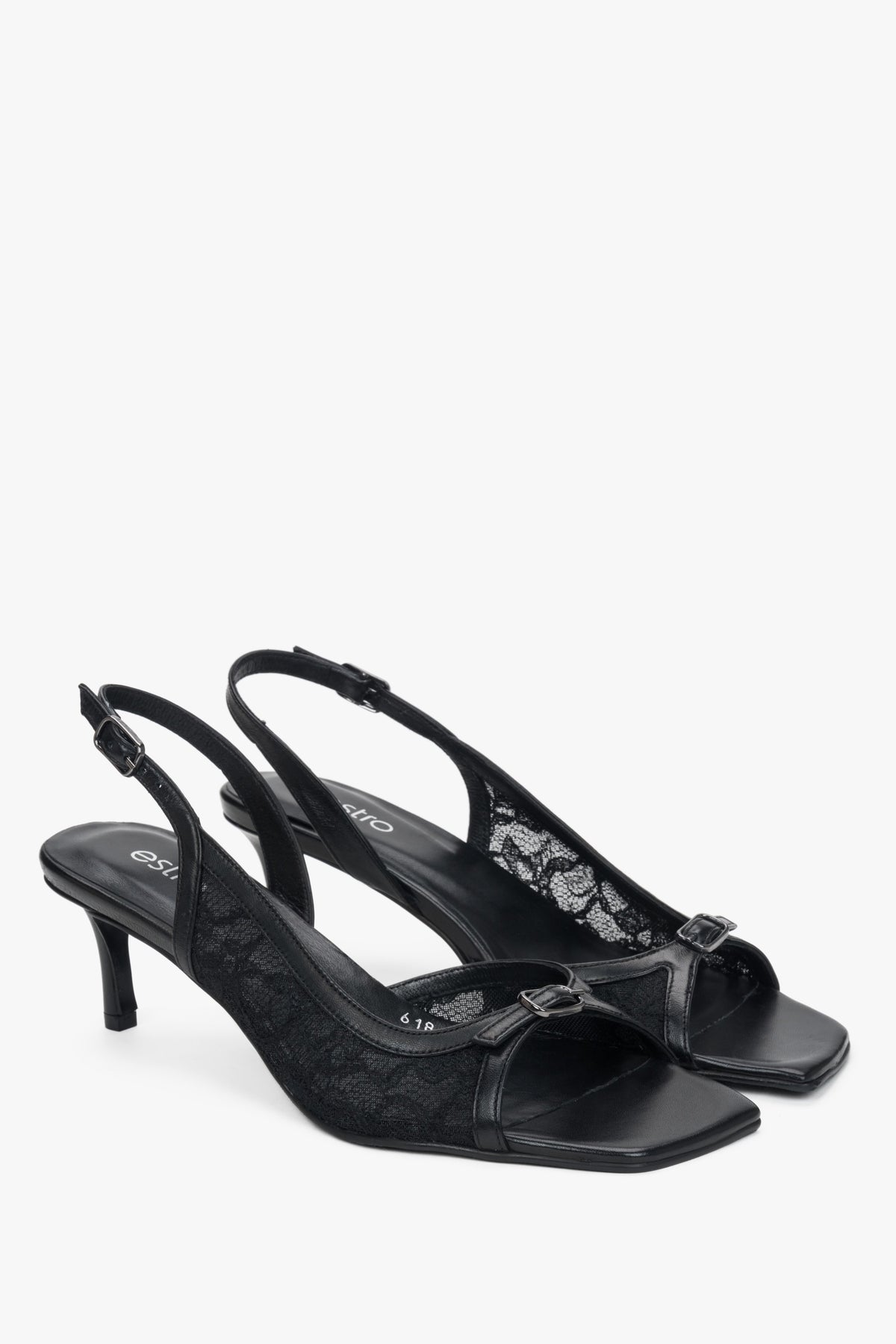Black slingback heeled sandals with lace detailing.