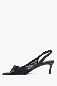 Elegant black women's sandals with decorative lace.