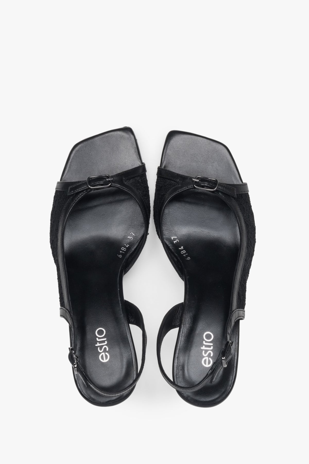 Black slingback heeled sandals with decorative lace.