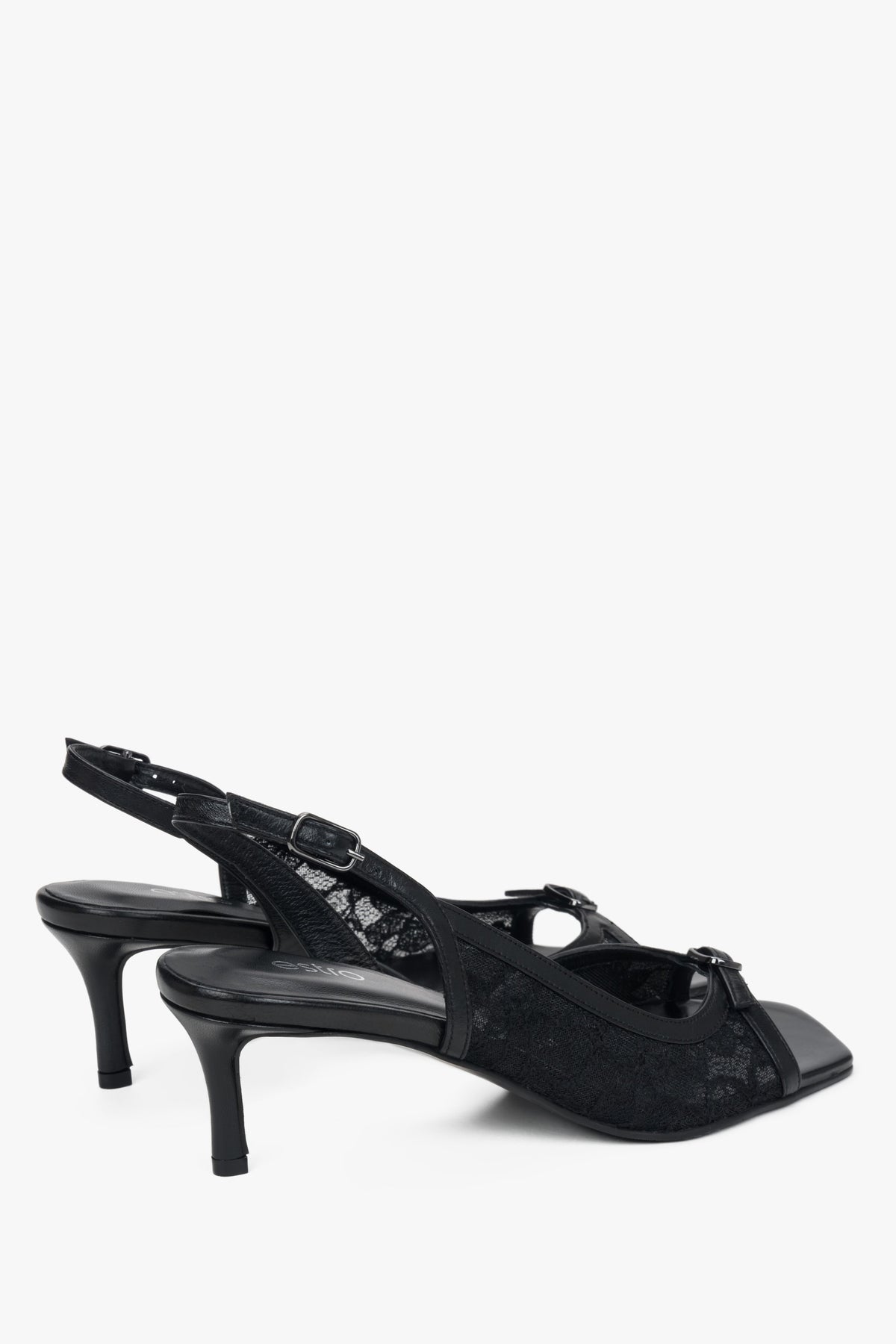 Black slingback heeled sandals with decorative lace.