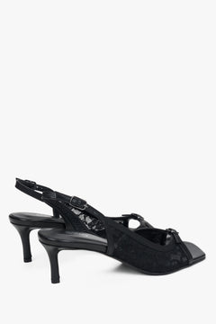Black slingback heeled sandals with decorative lace.