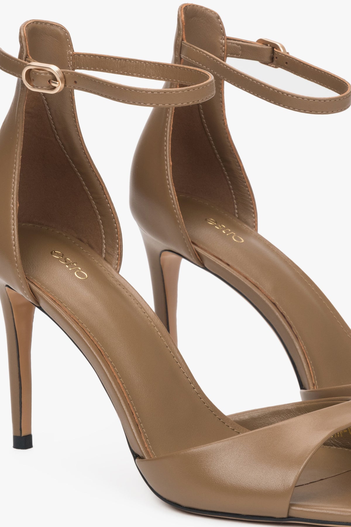 Women's brown leather sandals with a high heel by Estro.