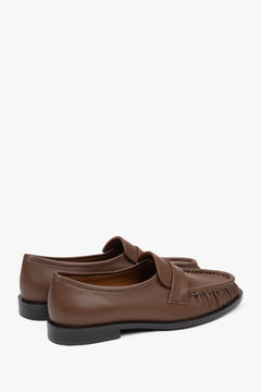 Brown women's loafers made of natural leather with decorative gathering by Estro.