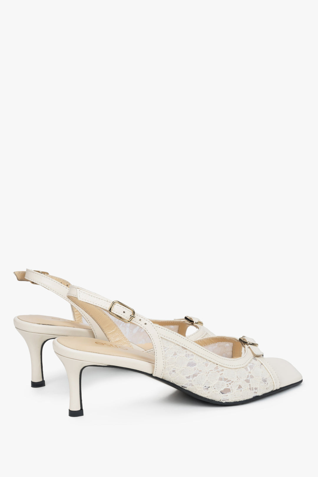 Elegant white women's slingback sandals with decorative lace.