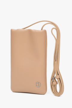 Beige natural leather phone bag.