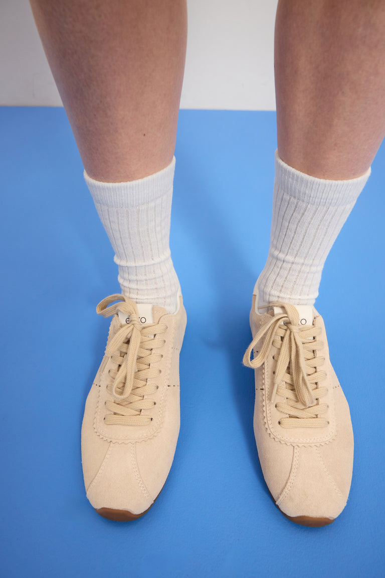 Women's sneakers by Estro made of natural velour in beige with a low sole.