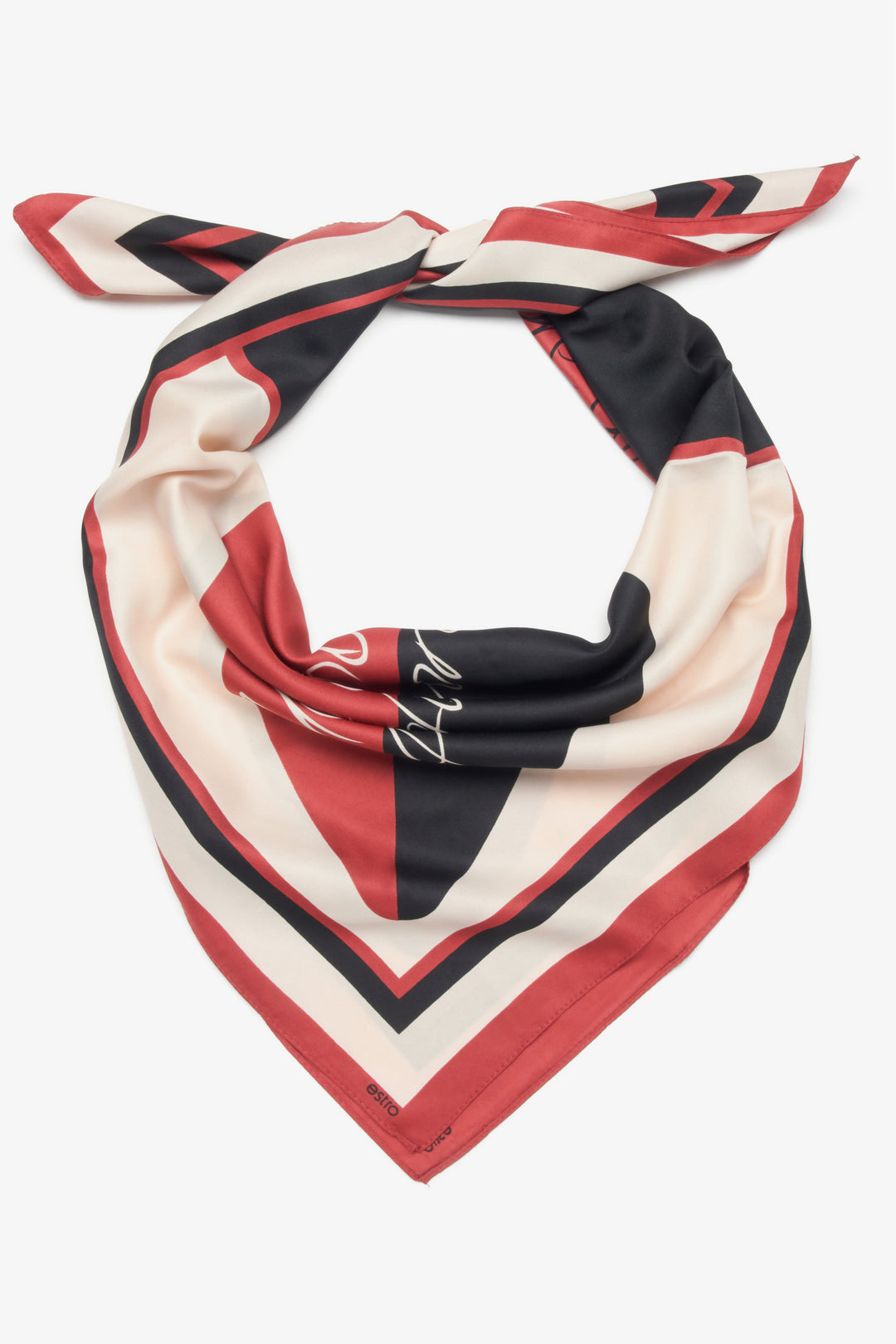 A stylish women's scarf from Estro, combining black, beige, and red in a heart pattern.