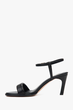 Stylish black women's sandals by Estro, crafted from natural leather.