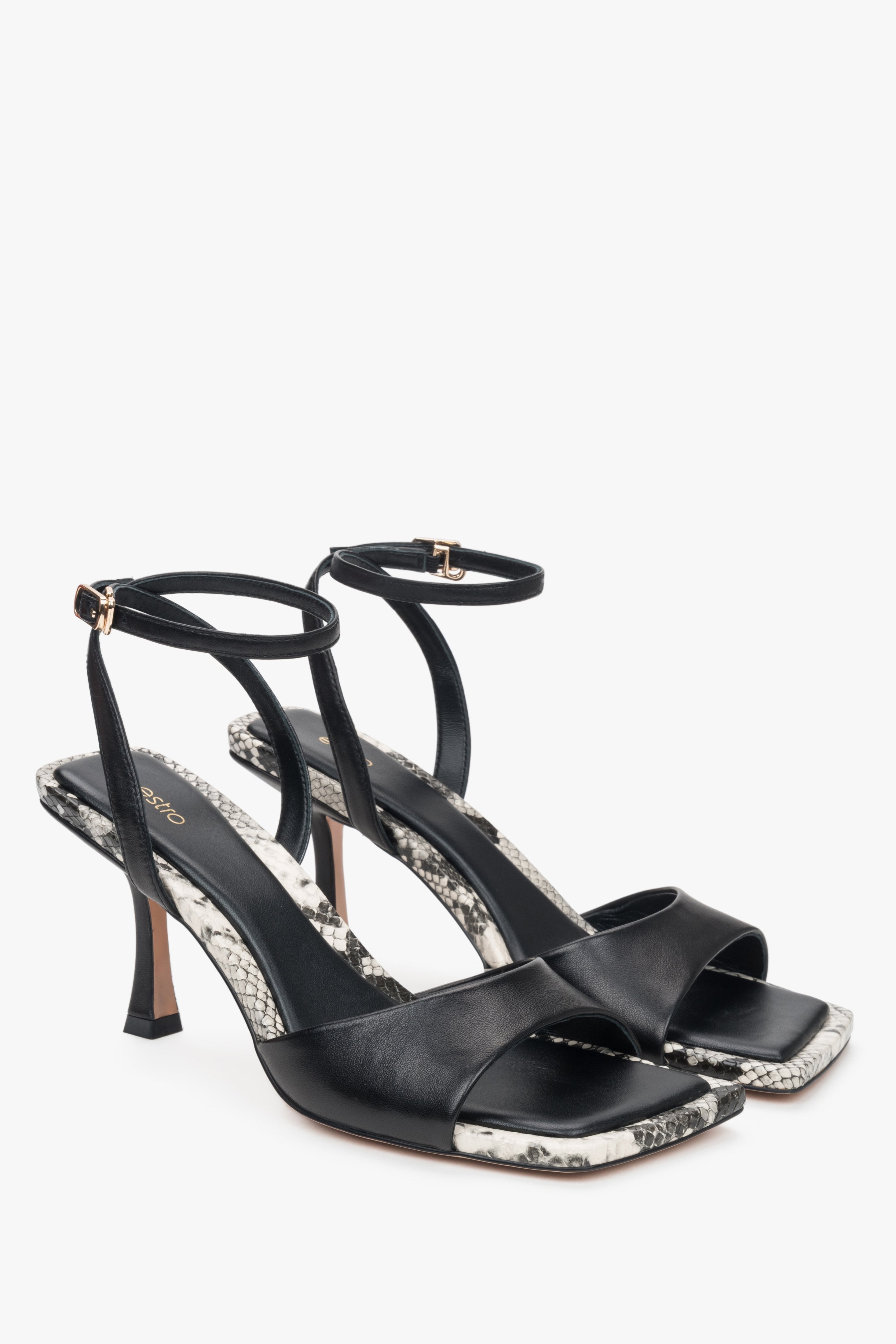 Stylish black women's sandals by Estro, crafted from natural leather.