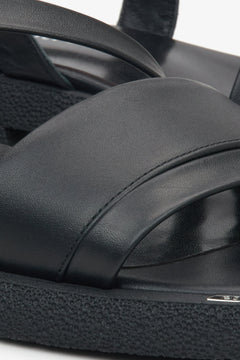 Black women's sandals by Estro – a combination of natural leather, close-up of the details.