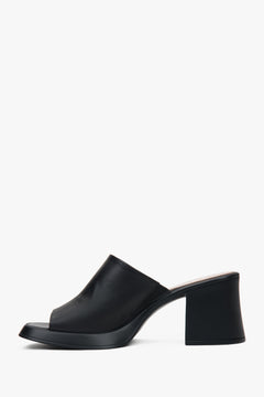 Stylish black women's mules by Estro, made of high-quality natural leather and set on a stable block heel.