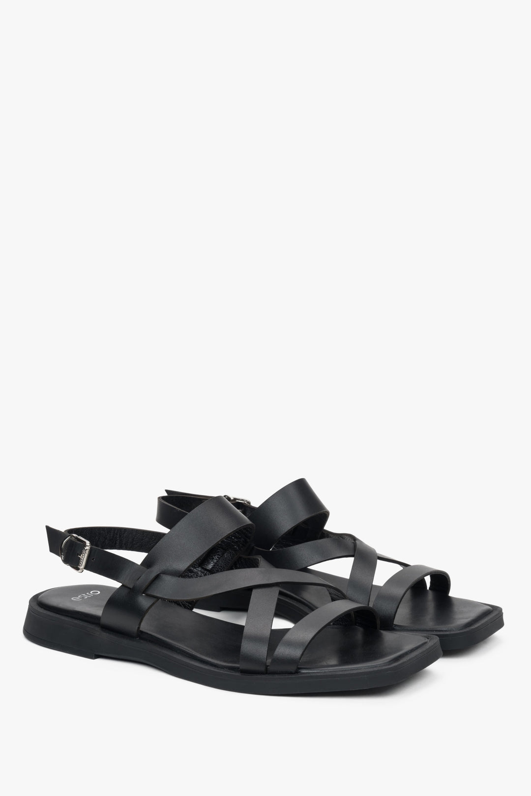 Elegant black women's sandals by Estro, made of natural leather, featuring a minimalist design with thin straps.