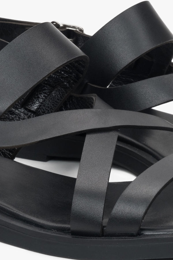 Black leather women's sandals by Estro – a combination of natural leather and a subtle thin-strap design – details.