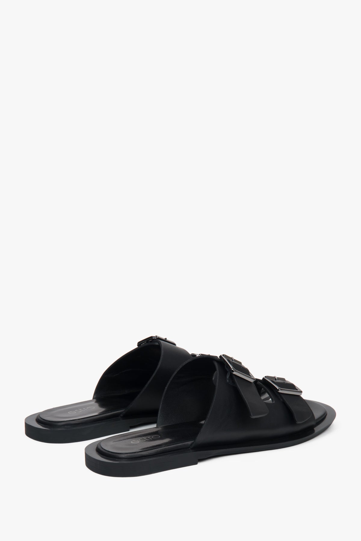 Stylish black women's slides by Estro, made of natural leather and featuring two distinctive straps—perfect for everyday wear.