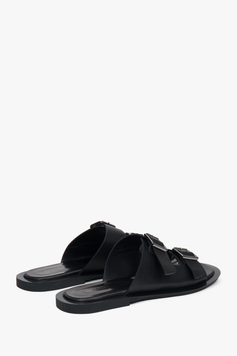 Stylish black women's slides by Estro, made of natural leather and featuring two distinctive straps—perfect for everyday wear.