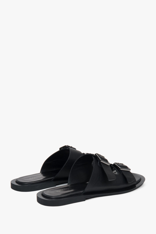 Stylish black women's slides by Estro, made of natural leather and featuring two distinctive straps—perfect for everyday wear.