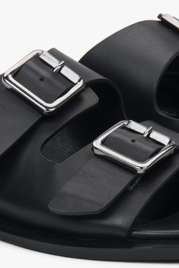 Black leather women's slides by Estro – a combination of natural leather and a simple two-strap design.
