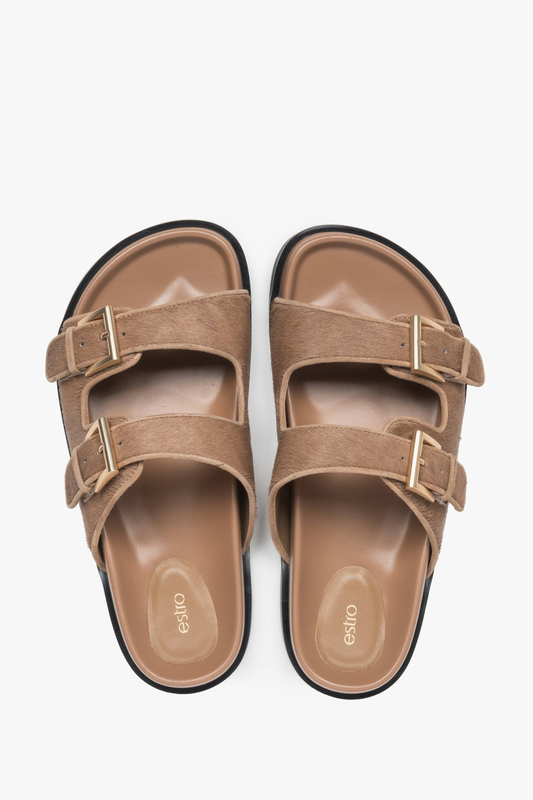 Practical brown women's slides by Estro made of natural leather.