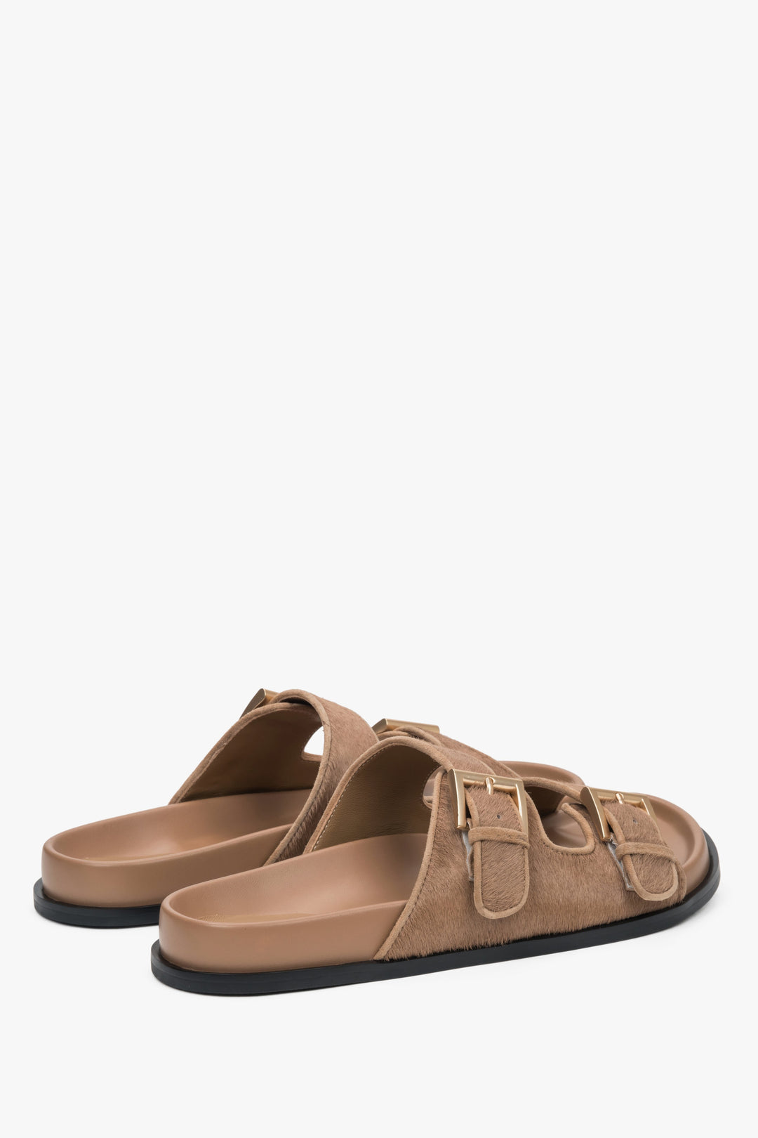 Comfortable brown women's slides by Estro, made of natural leather, offering maximum comfort with wide, adjustable straps.