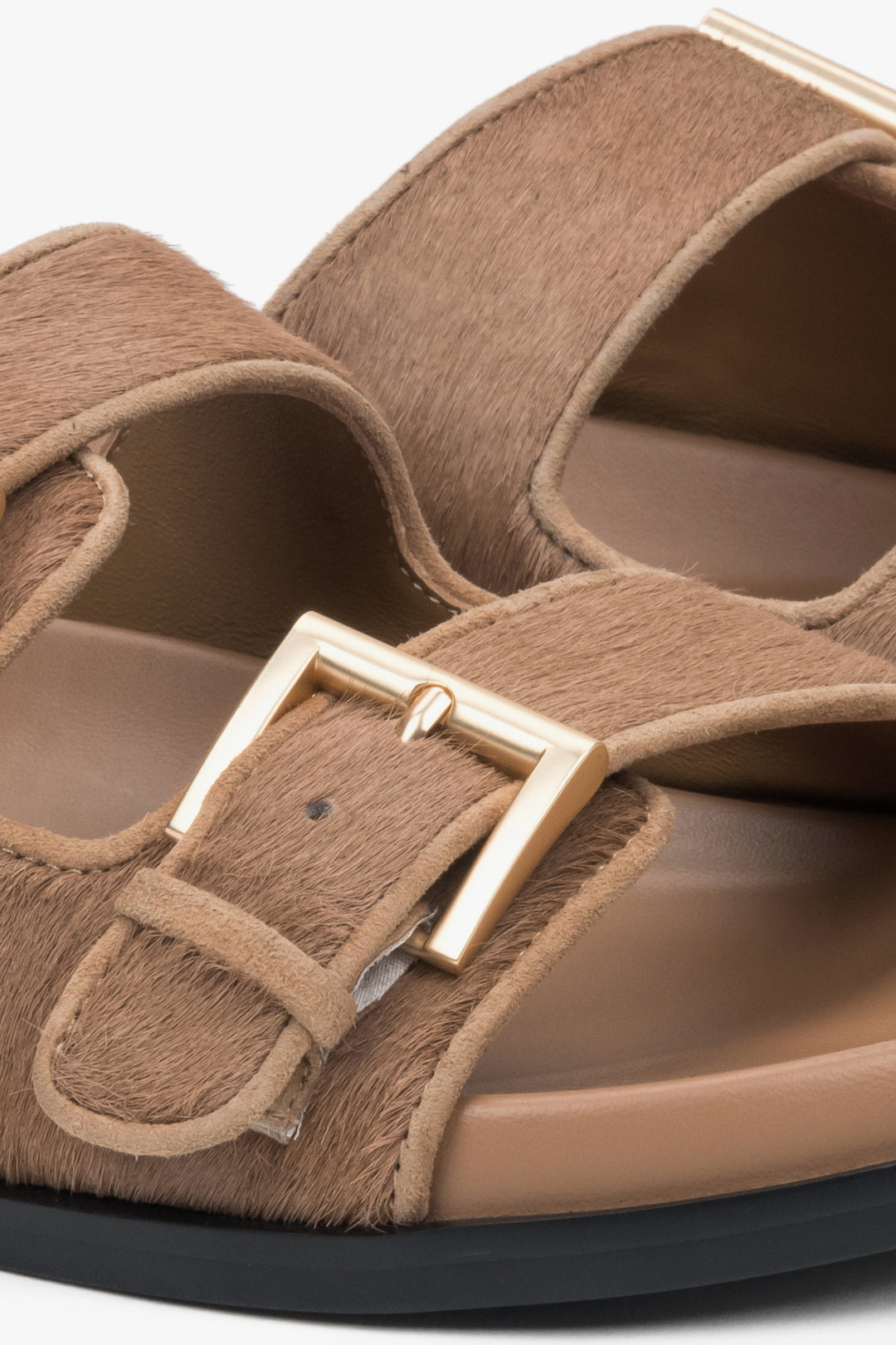 Brown women's slides made of natural leather with wide adjustable straps by Estro.