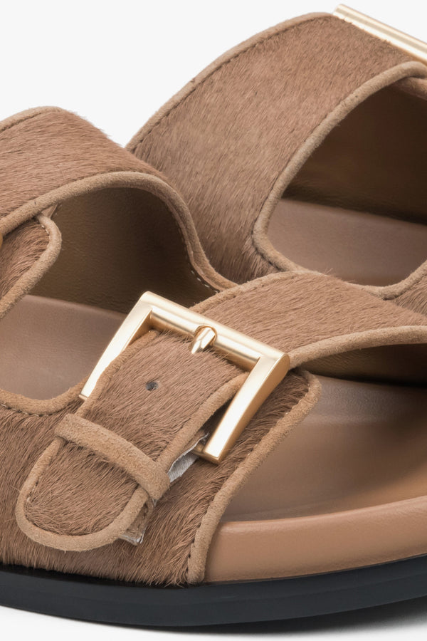Brown women's slides made of natural leather with wide adjustable straps by Estro.