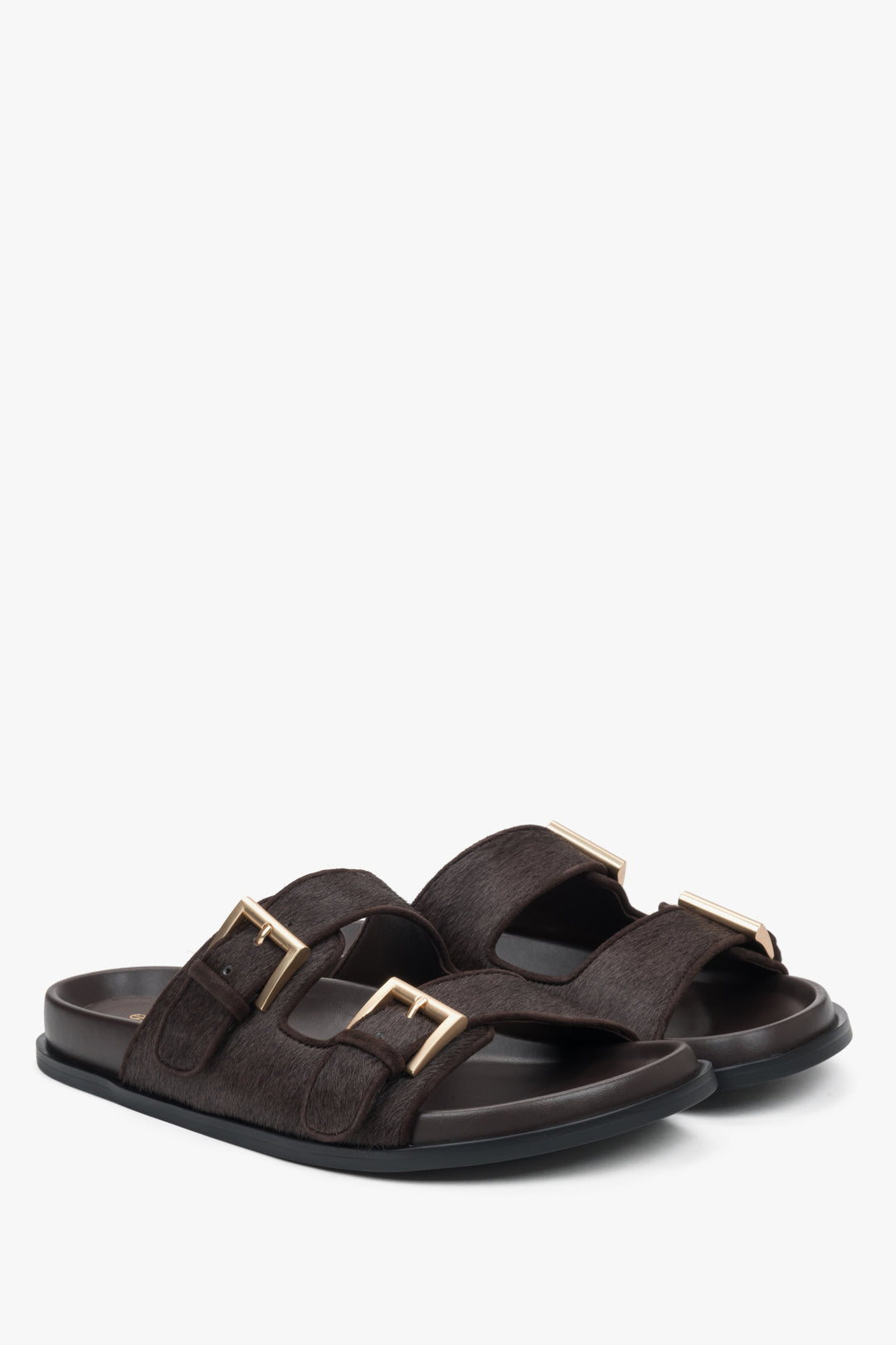 Comfortable dark brown women's slides by Estro, made of natural leather, with wide adjustable straps for a perfect fit.
