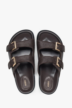 Practical dark brown women's slides by Estro made of natural leather.