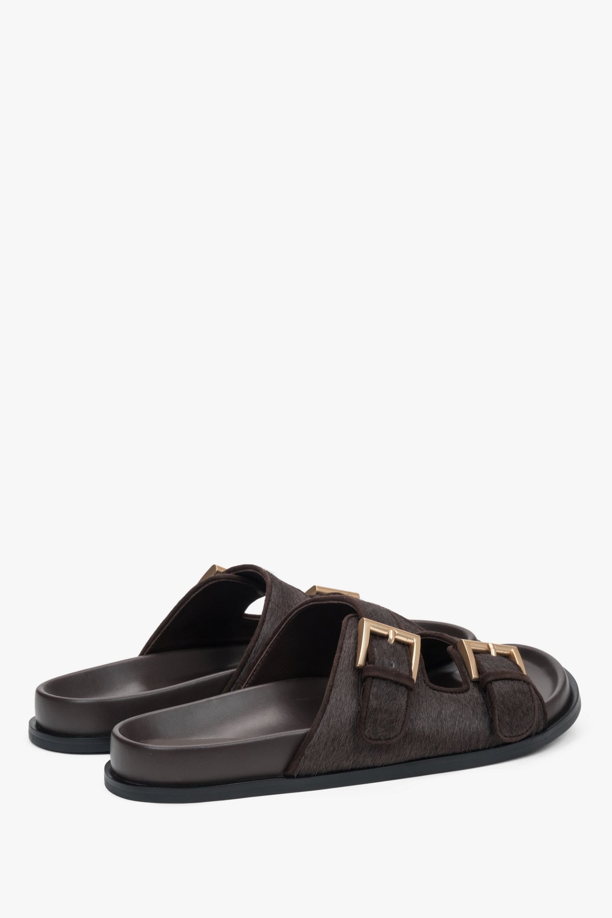 Comfortable dark brown women's slides by Estro, made of natural leather, offering maximum comfort with wide, adjustable straps.