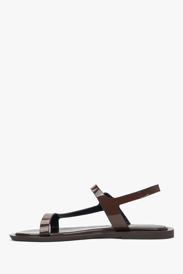 Stylish dark brown women's sandals by Estro, crafted from high-quality patent leather, adding a touch of shine to any outfit.
